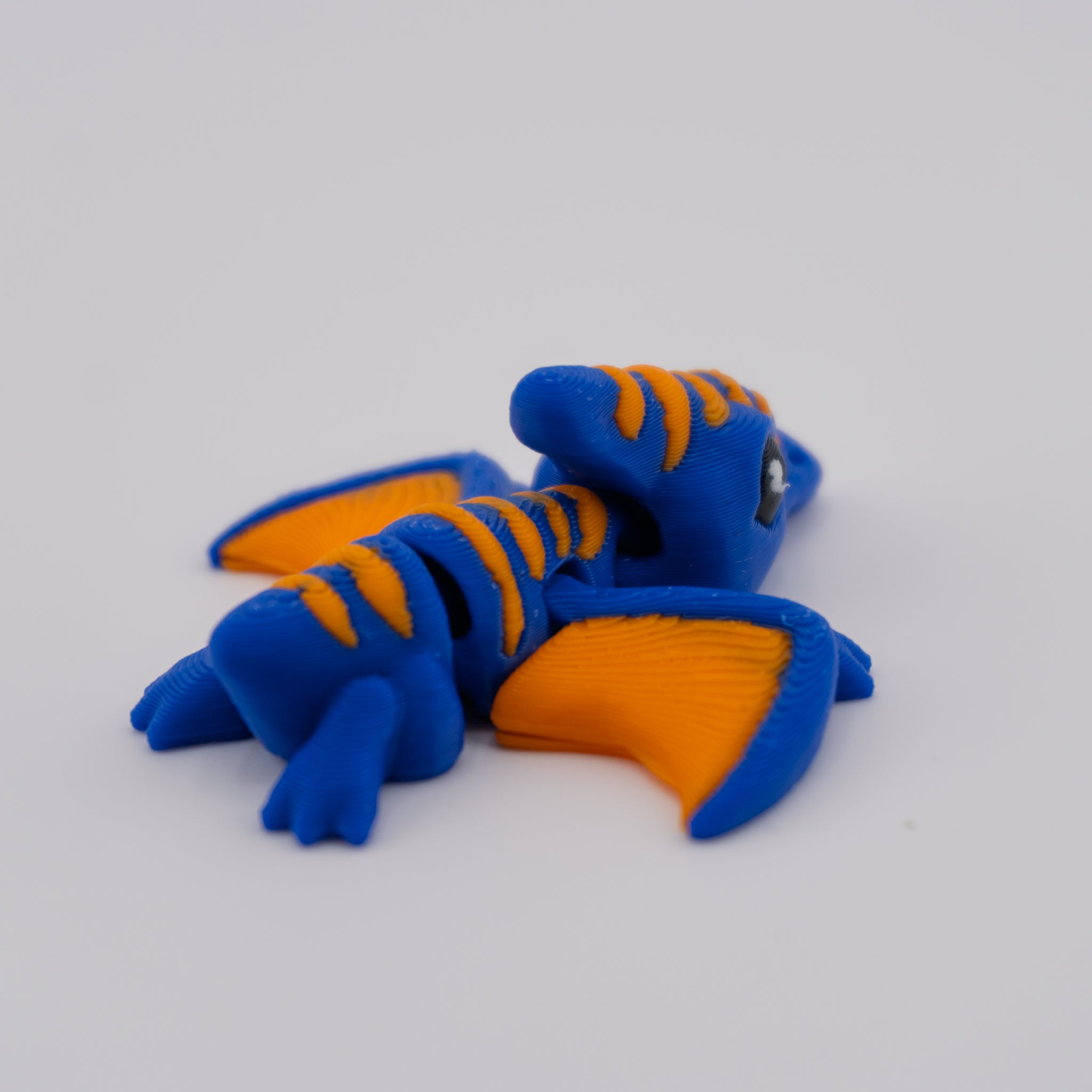 Hatchling Air Dino – Articulated Mini Creature | About 2" Wide