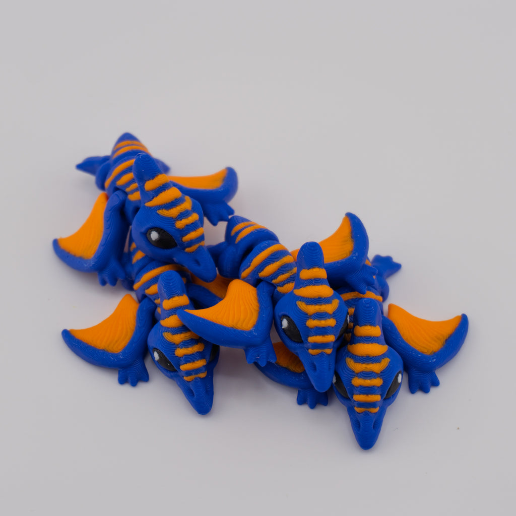 Hatchling Air Dino – Articulated Mini Creature | About 2" Wide