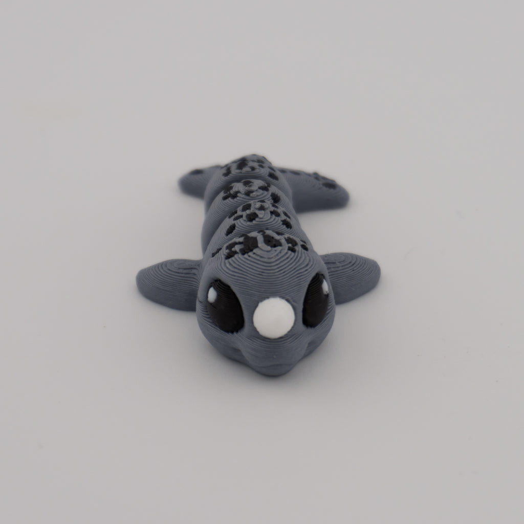 Flexi Narwhal Hatchling – Articulated Mini Sea Creature (Santa Hat or Regular)