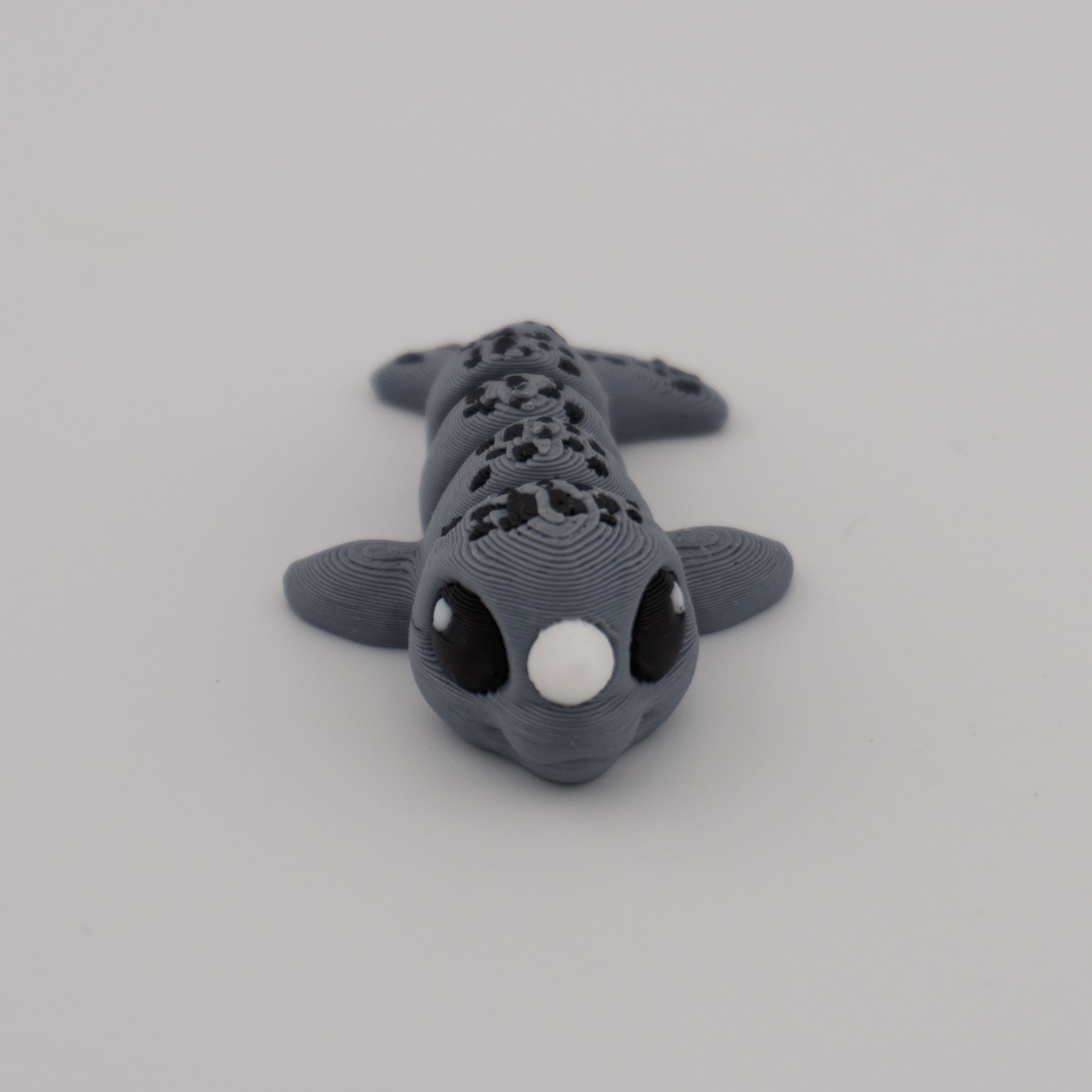 Flexi Narwhal Hatchling – Articulated Mini Sea Creature (Santa Hat or Regular)