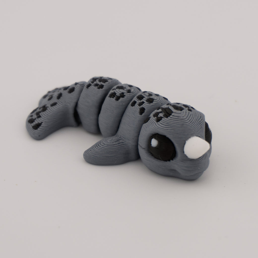 Flexi Narwhal Hatchling – Articulated Mini Sea Creature (Santa Hat or Regular)