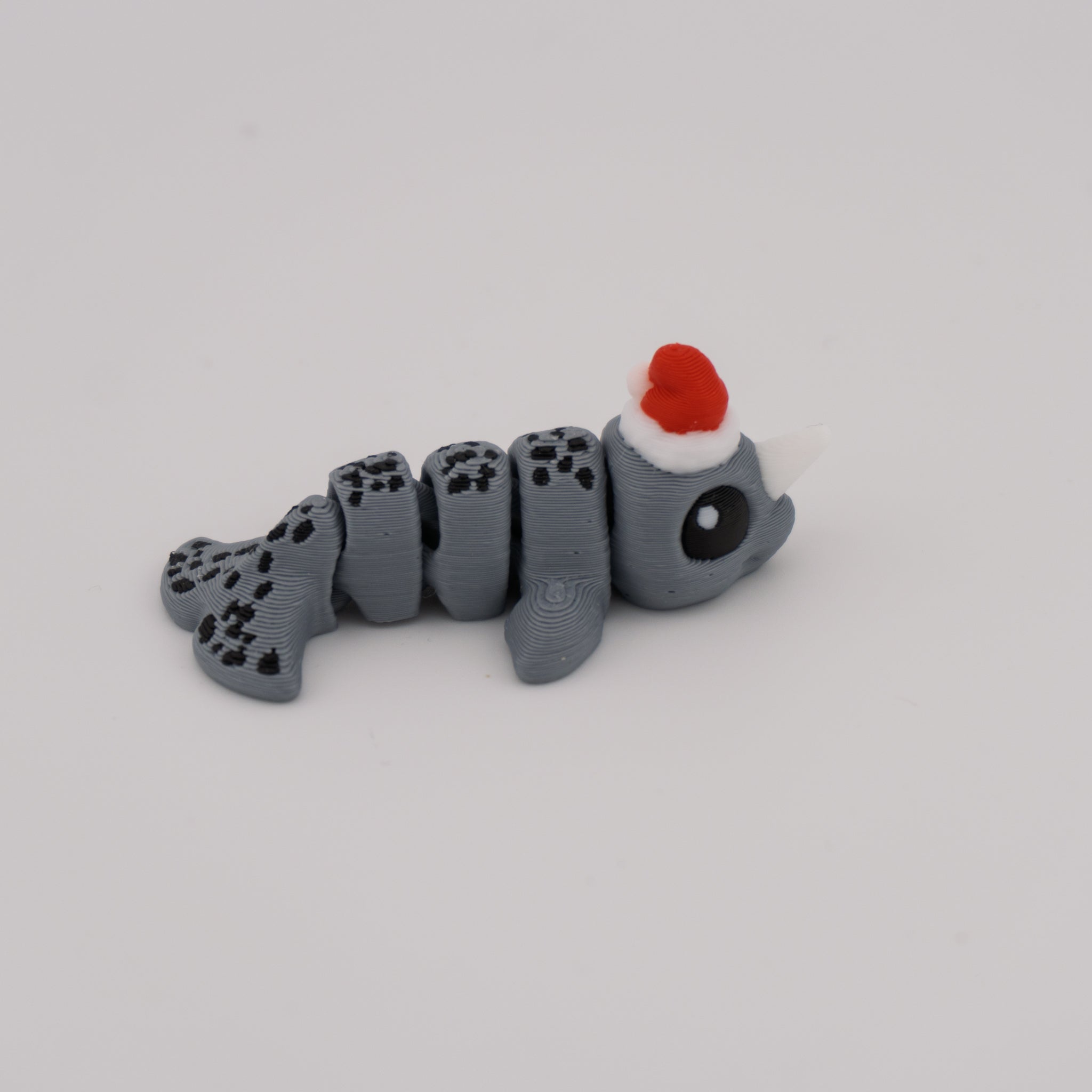 Flexi Narwhal Hatchling – Articulated Mini Sea Creature (Santa Hat or Regular)