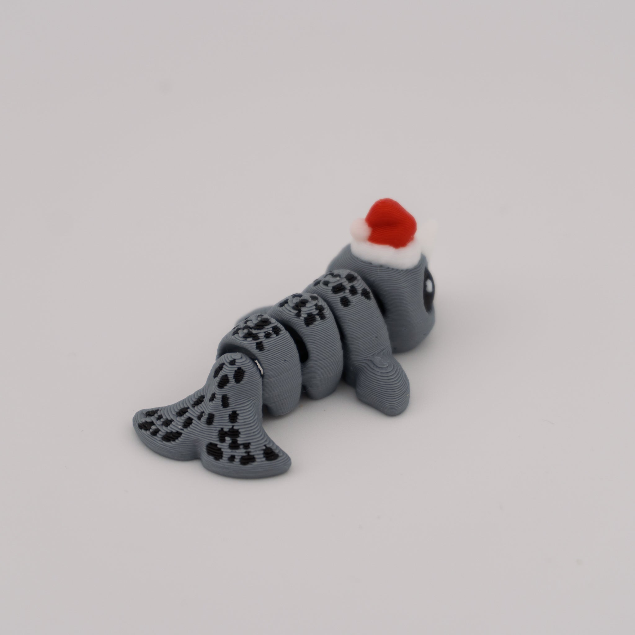 Flexi Narwhal Hatchling – Articulated Mini Sea Creature (Santa Hat or Regular)