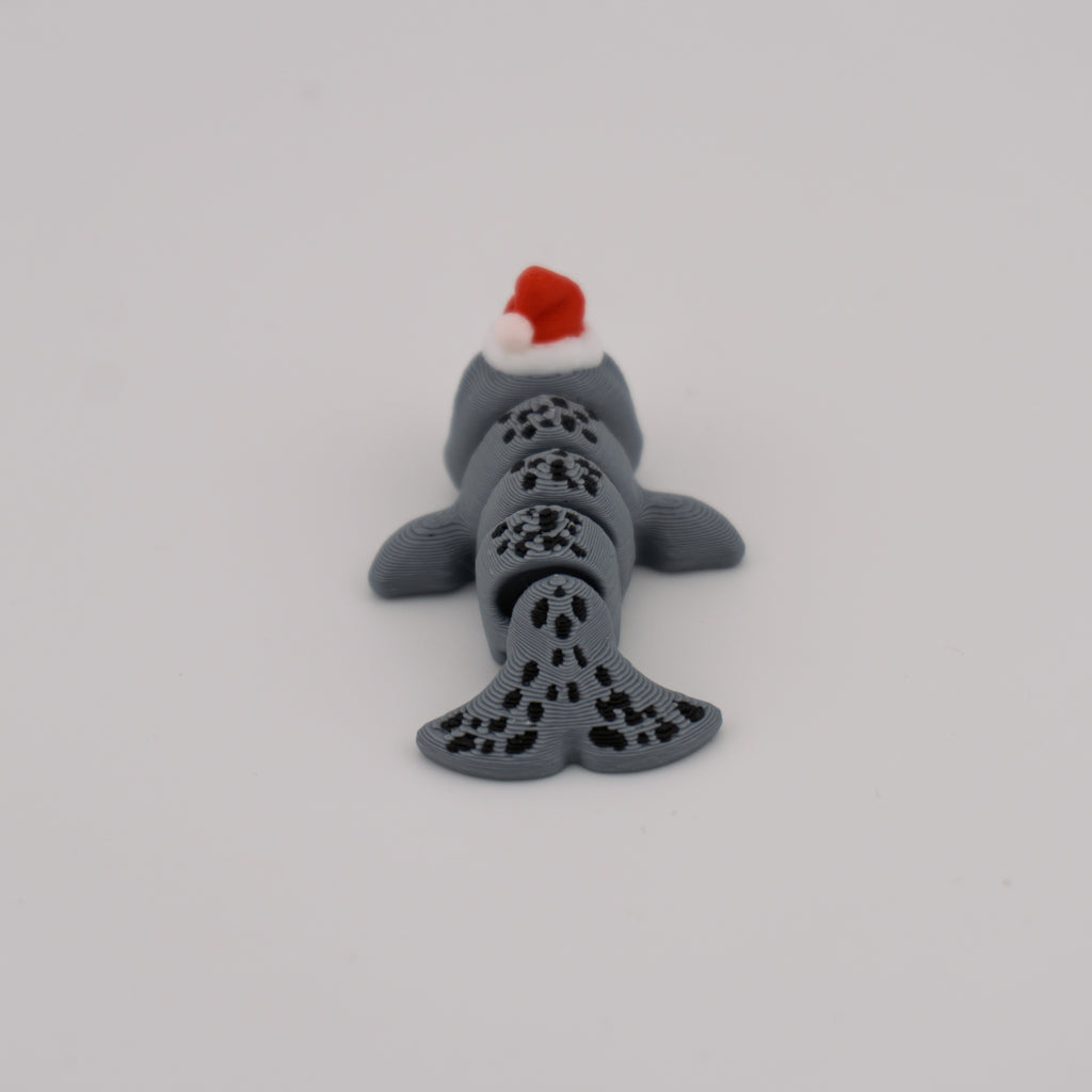 Flexi Narwhal Hatchling – Articulated Mini Sea Creature (Santa Hat or Regular)