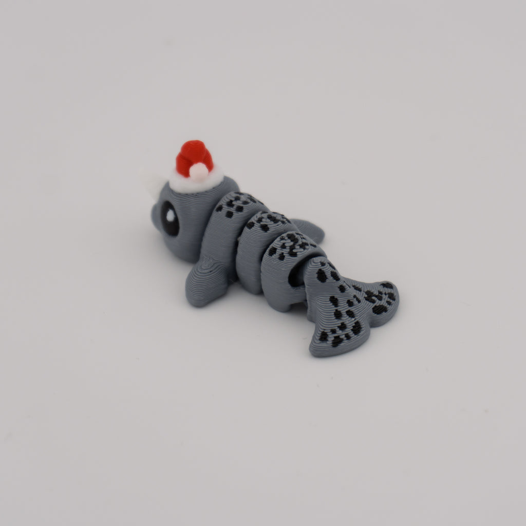 Flexi Narwhal Hatchling – Articulated Mini Sea Creature (Santa Hat or Regular)