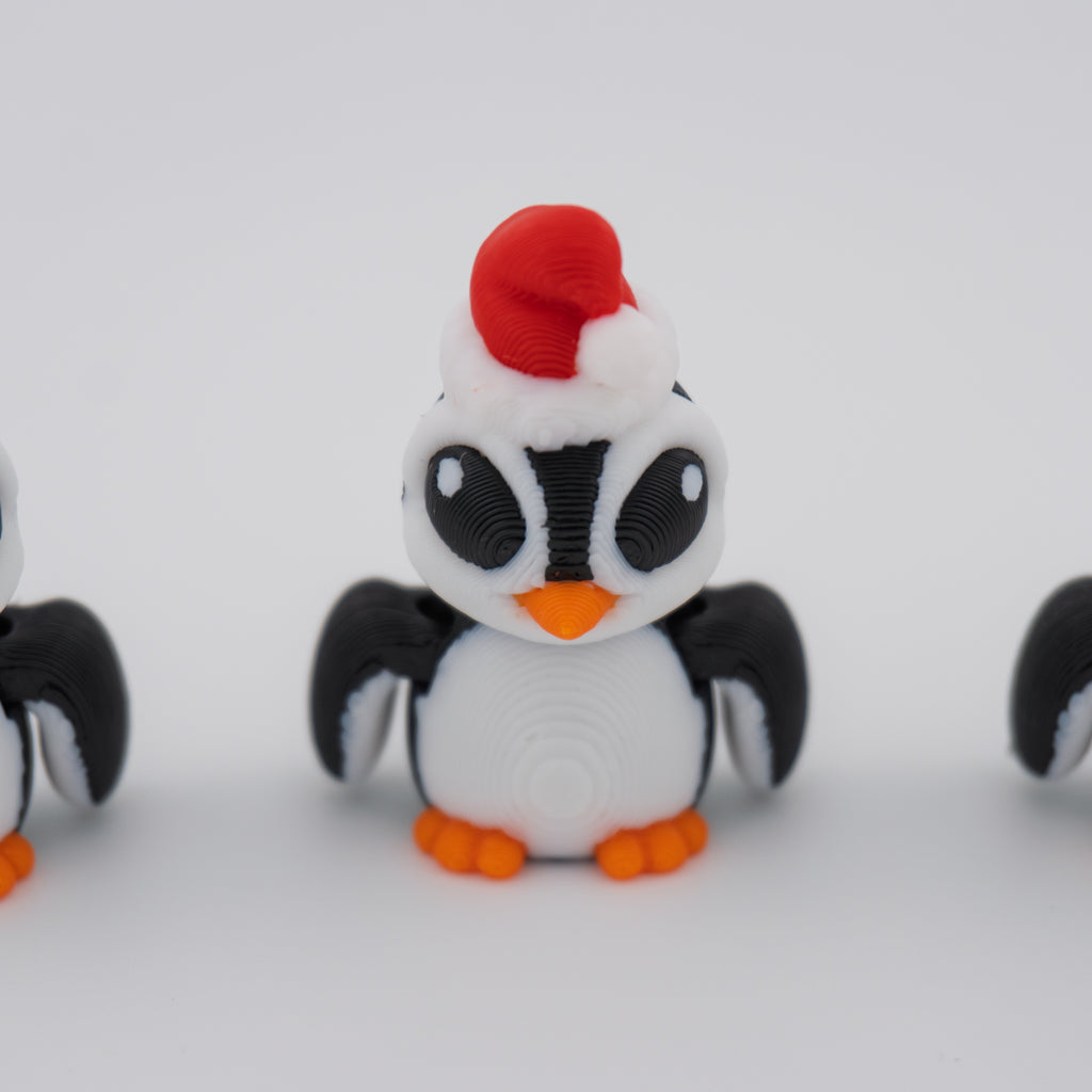 Christmas Santa Penguin Hatchling – Articulated Holiday Fidget Figure – 1.7 Inch