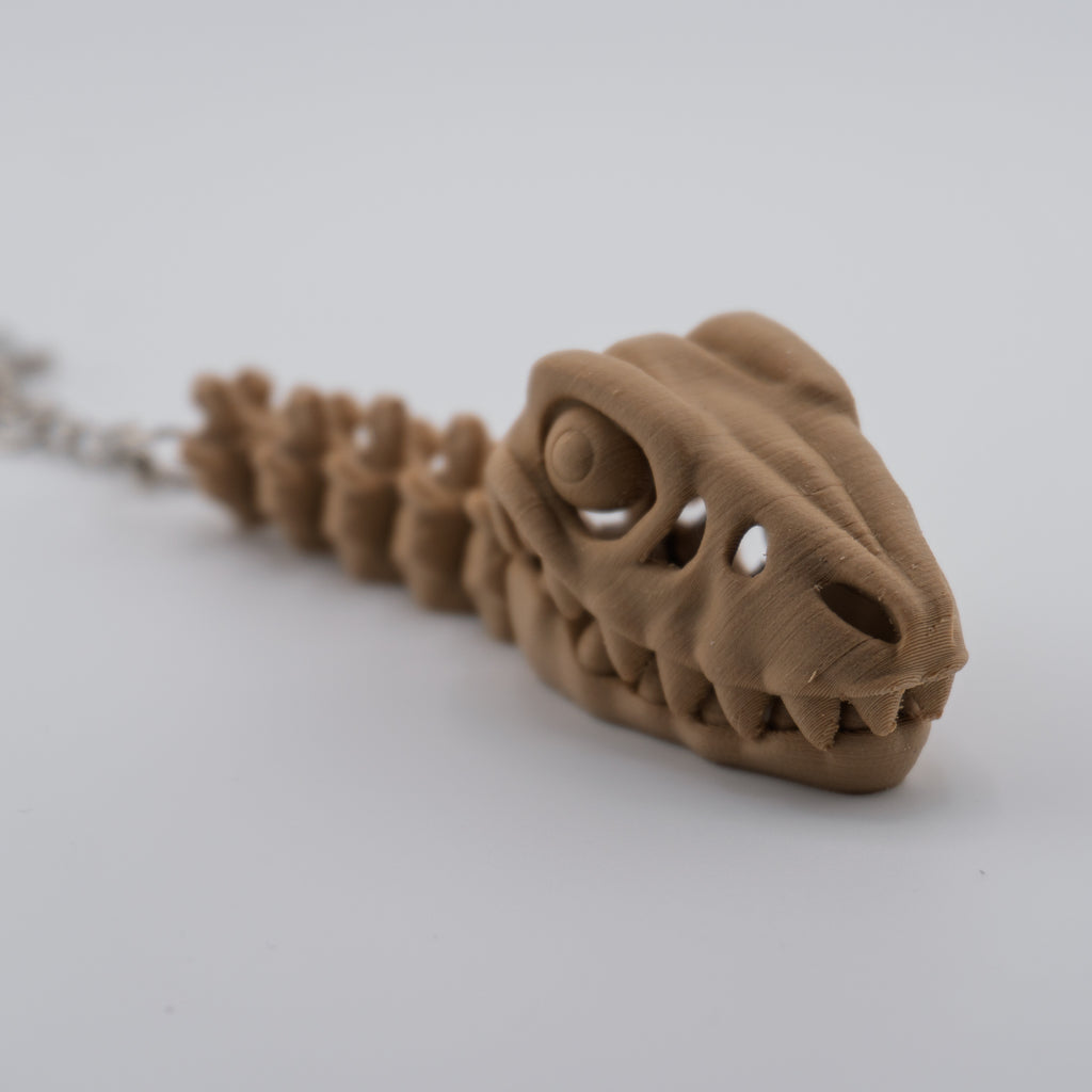 Skeleton Raptor Keychain | Mini Articulated Dino Fossil