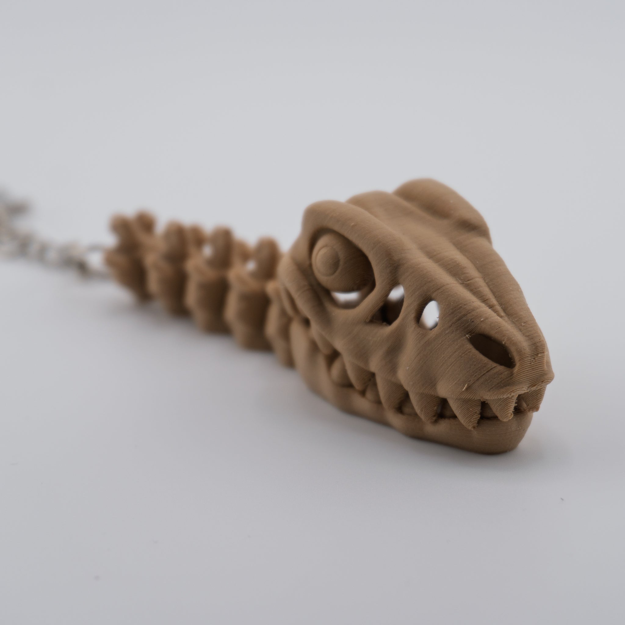Skeleton Raptor Keychain | Mini Articulated Dino Fossil