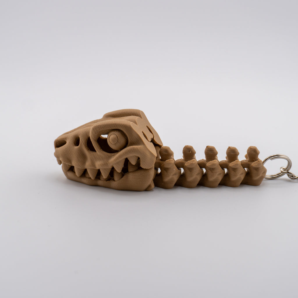 Skeleton Raptor Keychain | Mini Articulated Dino Fossil