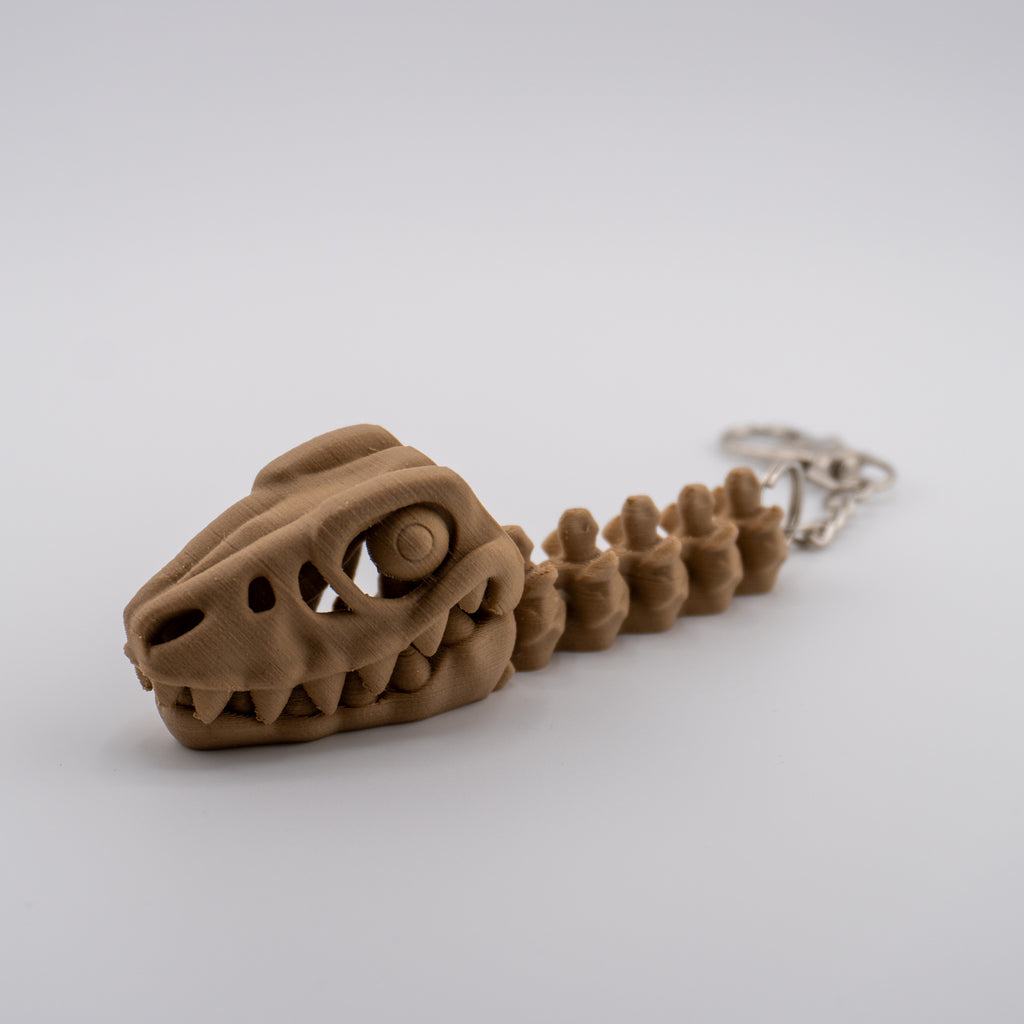 Skeleton Raptor Keychain | Mini Articulated Dino Fossil